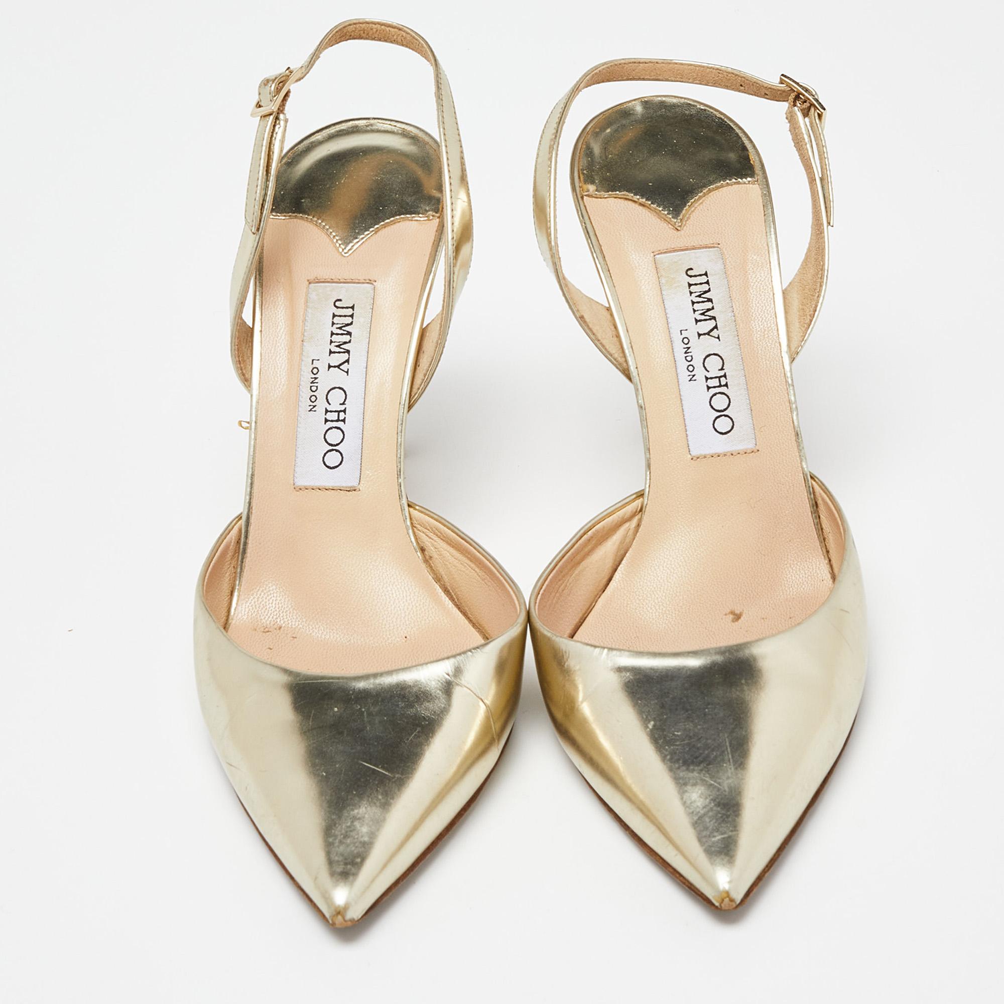 Treat your feet to these sandals from Jimmy Choo. The gold sandals are exquisitely crafted from leather and designed with slingbacks, pointed toes, and 10 cm heels.

