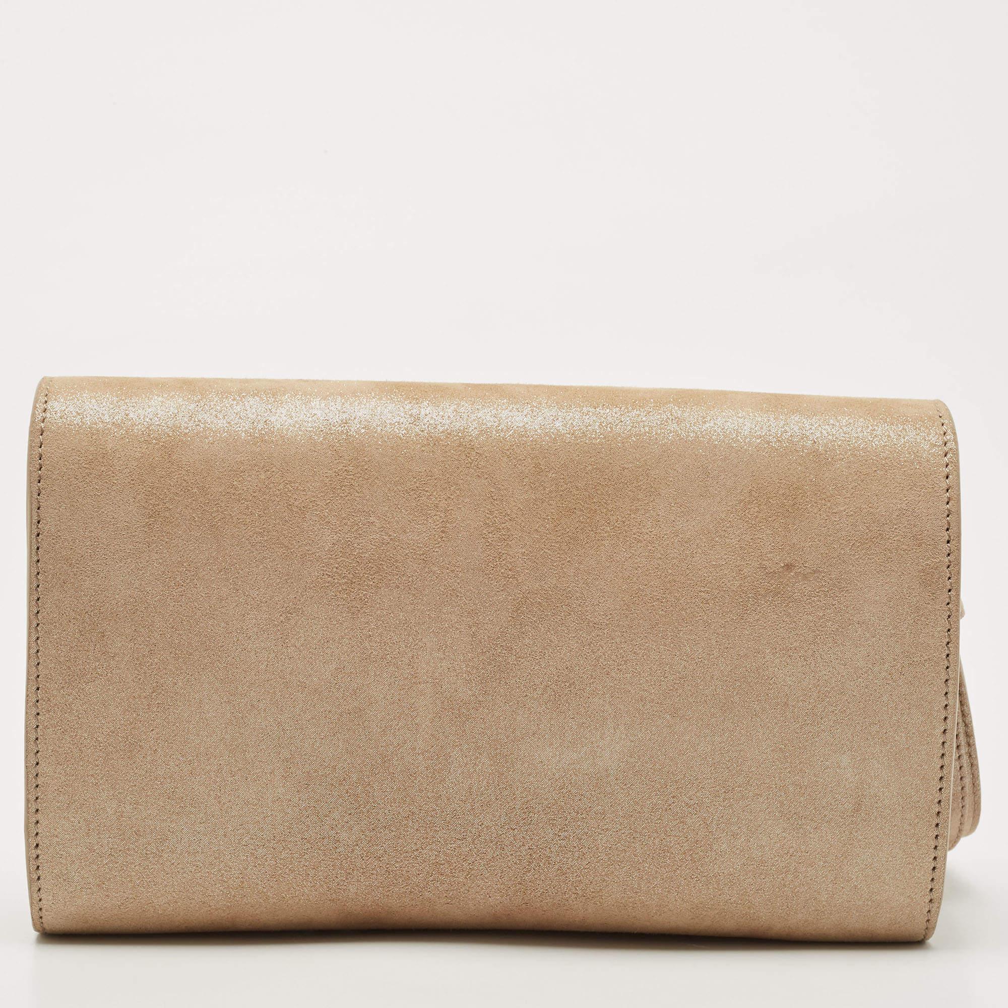 This clutch is just the right accessory to compliment your chic ensemble. It comes crafted in quality material featuring a well-sized interior that can comfortably hold all your little essentials.

Includes: Info Booklet, Authenticity Card, Brand