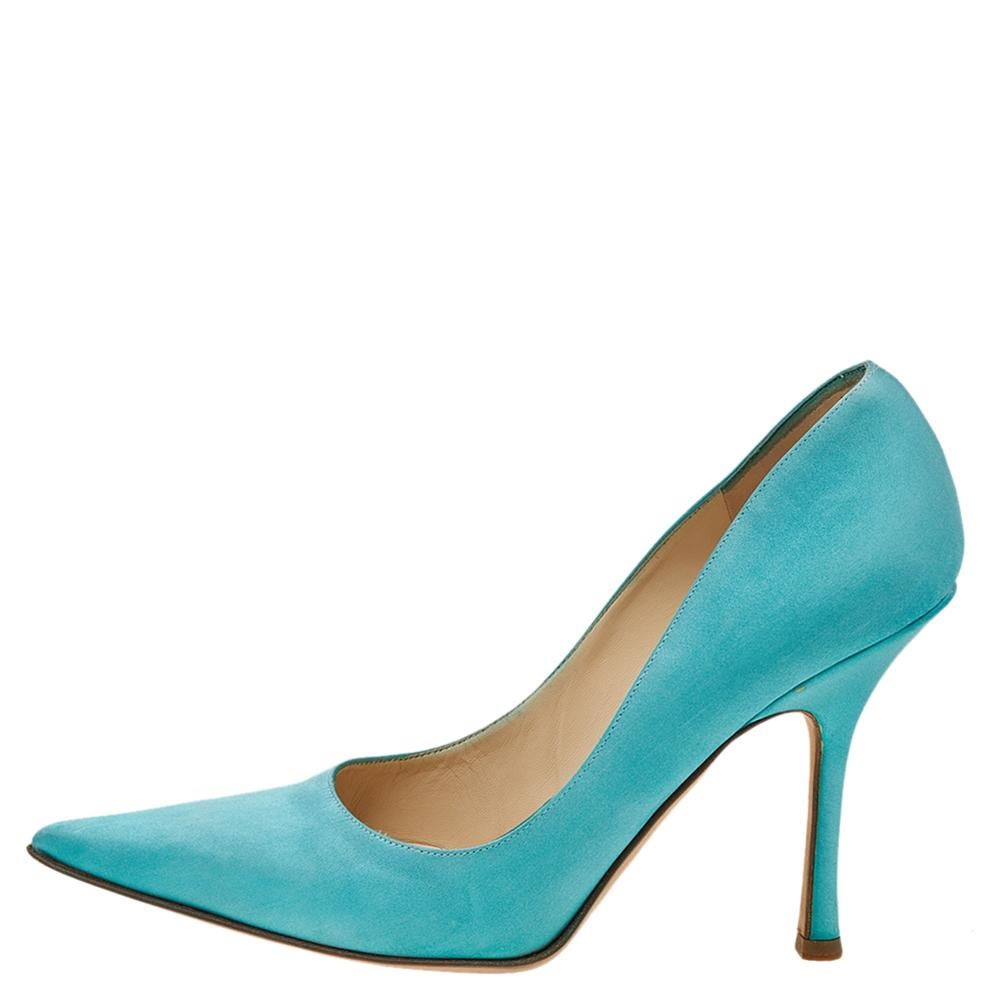 Lustrous satin shines with a jeweled bow at the point-toe. Self-covered heel measures 3.5