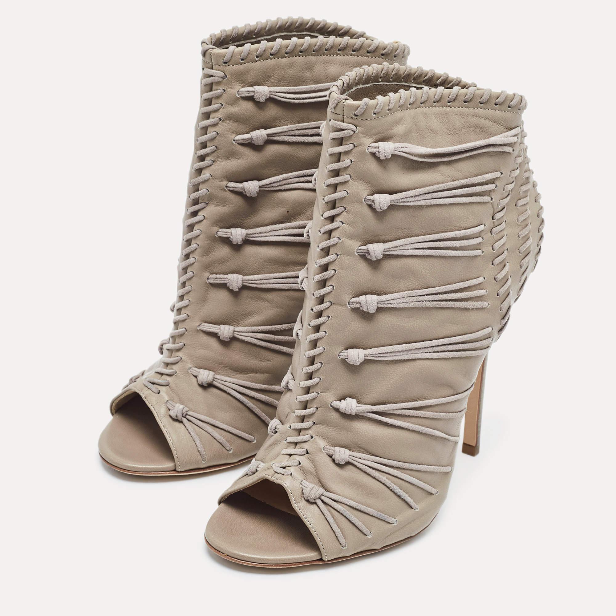 Enjoy the most fashionable days with these stylish Jimmy Choo ankle boots. Modern in design and craftsmanship they are fashioned to keep you comfortable and chic