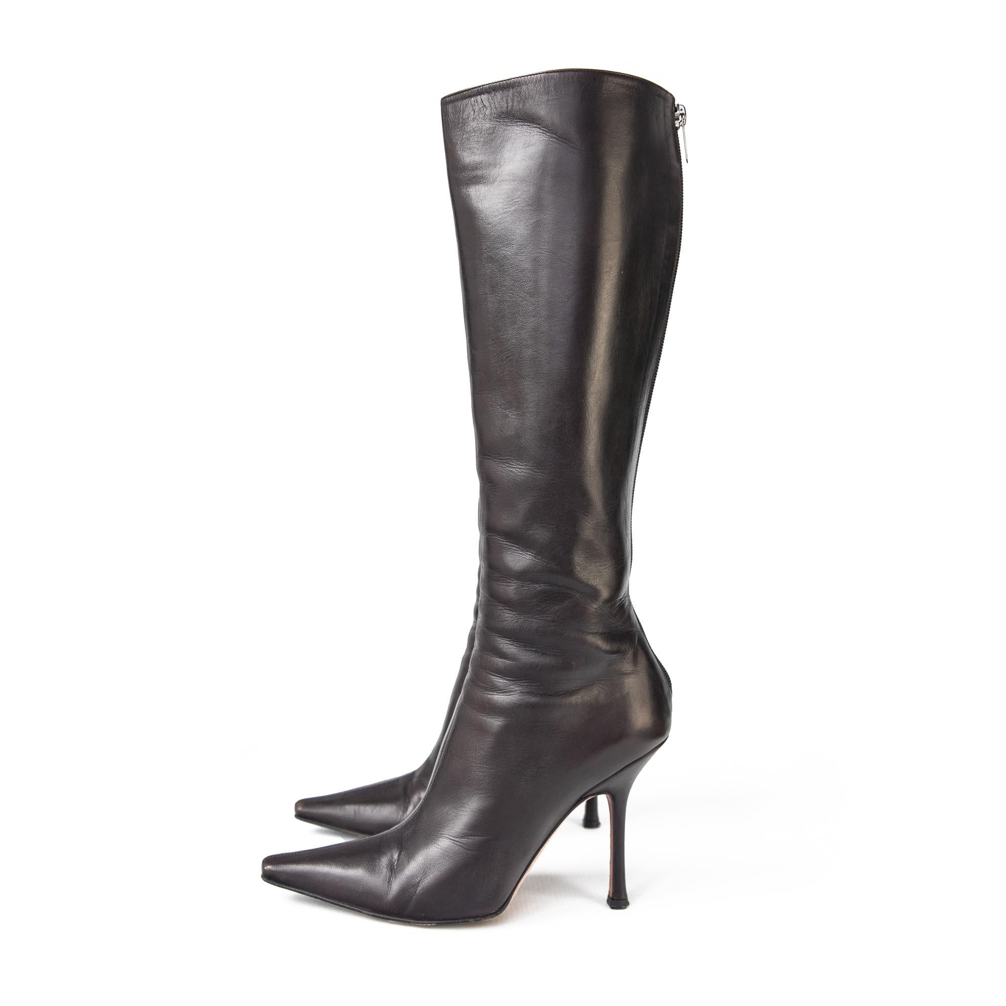 Jimmy Choo Kid leather coffee orchid boots.

These are one of the best vintage pointed leather boots you can buy. 

They're elegant and the shape is so unique it's instantly recognisable.

High quality coffee brown calfskin leather as you would
