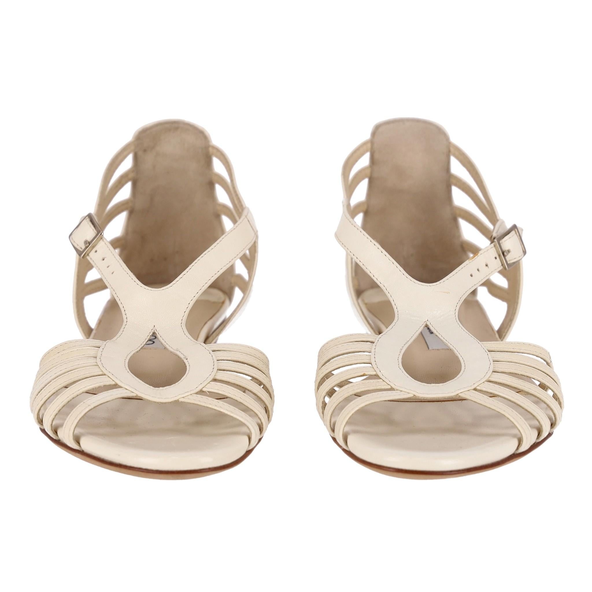 Jimmy Choo Leather Gladiator Sandals

Ivory flat sandals crafted from leather with strappy gladiator design.

Detailed with open toe and adjustable, buckled closure to the side.

Rrp Approx. £650

Size – 36

Condition – Good - Very Good (Minor marks