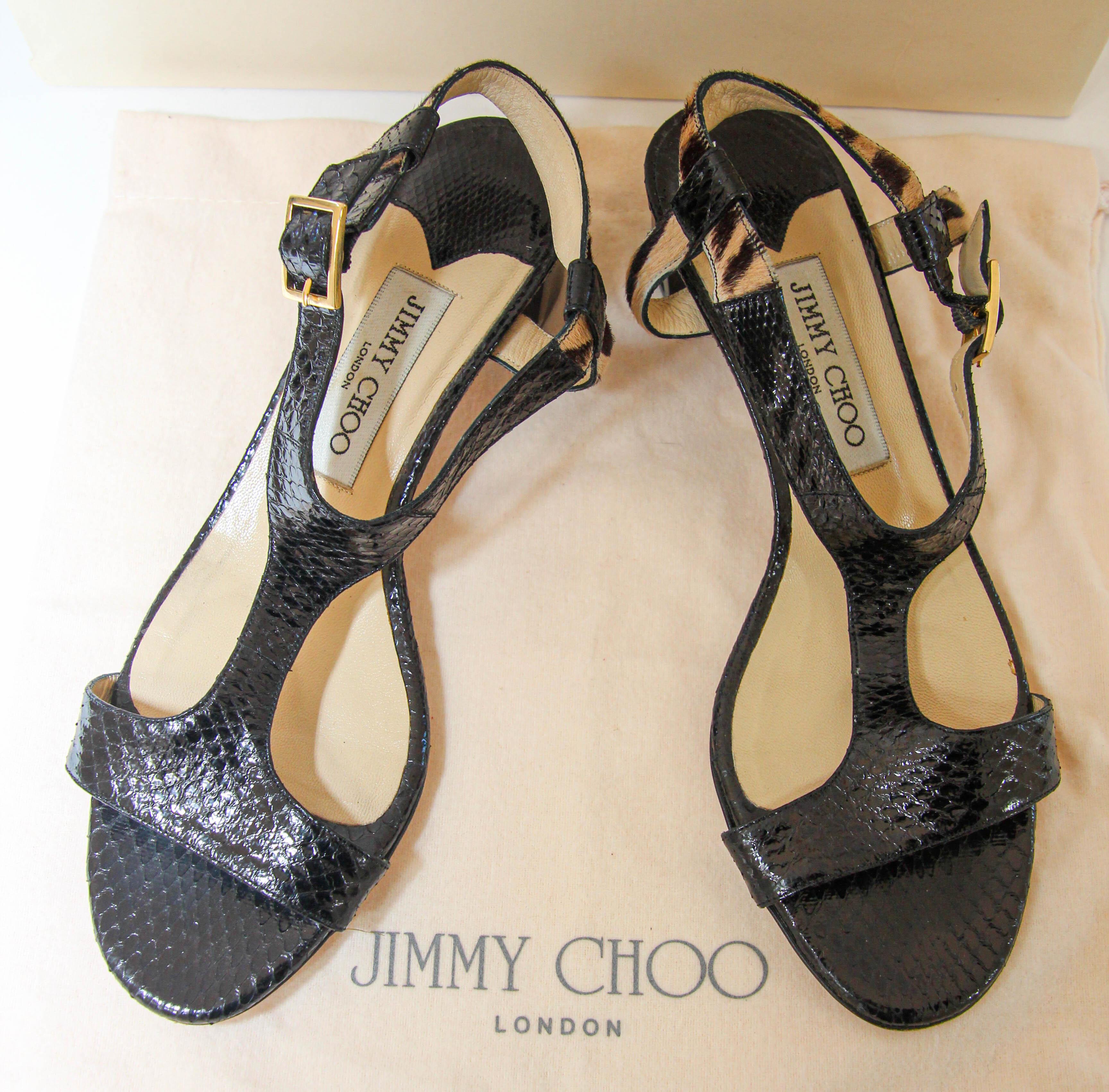JIMMY CHOO black leather JIN T-Strap Slingback with Pony Hair.
Shoes 38.
100% authentic Jimmy Choo 'Jin' slingback sandals in black snake design leather with block-heel. 
Come with dust bag and box.
Made in Italy.
Jimmy Choo London
Imprinted Size