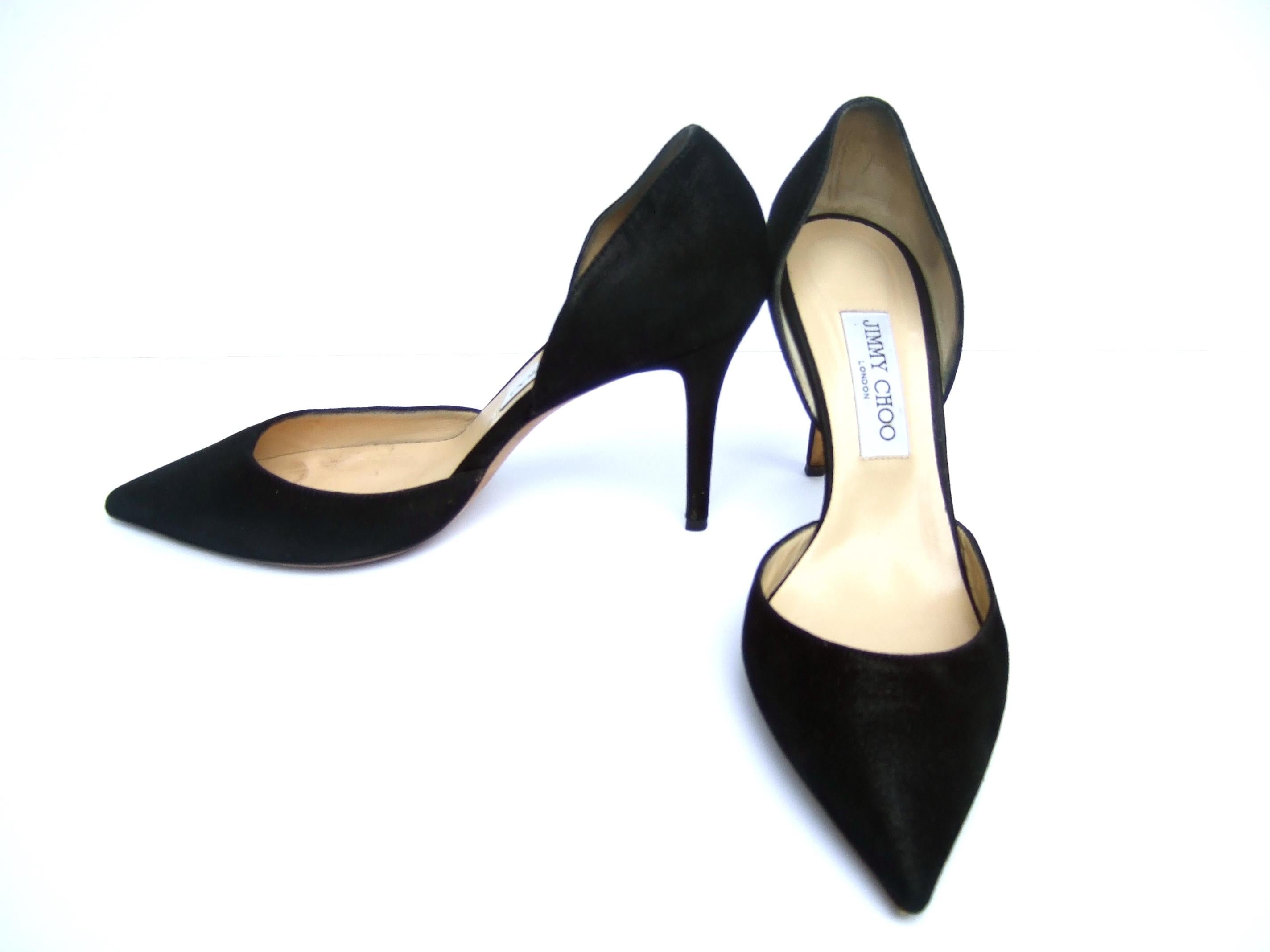 Jimmy Choo London Italian black brushed leather stiletto spike pumps Size 40 c 1990s
The classic black leather pumps are designed with brushed black leather 
with a slight matte sheen 

Designed by Jimmy Choo London Made in Italy Size 40
The