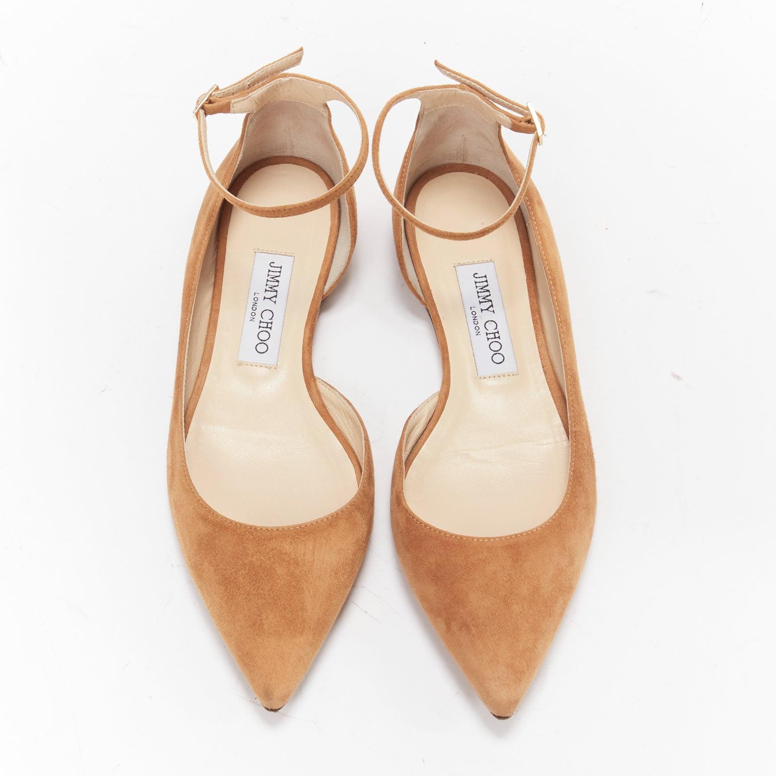 JIMMY CHOO Lucy tan brown suede ankle strap point toe half dorsay flats EU37.5
Reference: LNKO/A02198
Brand: Jimmy Choo
Model: Lucy
Material: Leather
Color: Tan Brown
Pattern: Solid
Closure: Ankle Strap
Lining: Beige Leather
Made in: