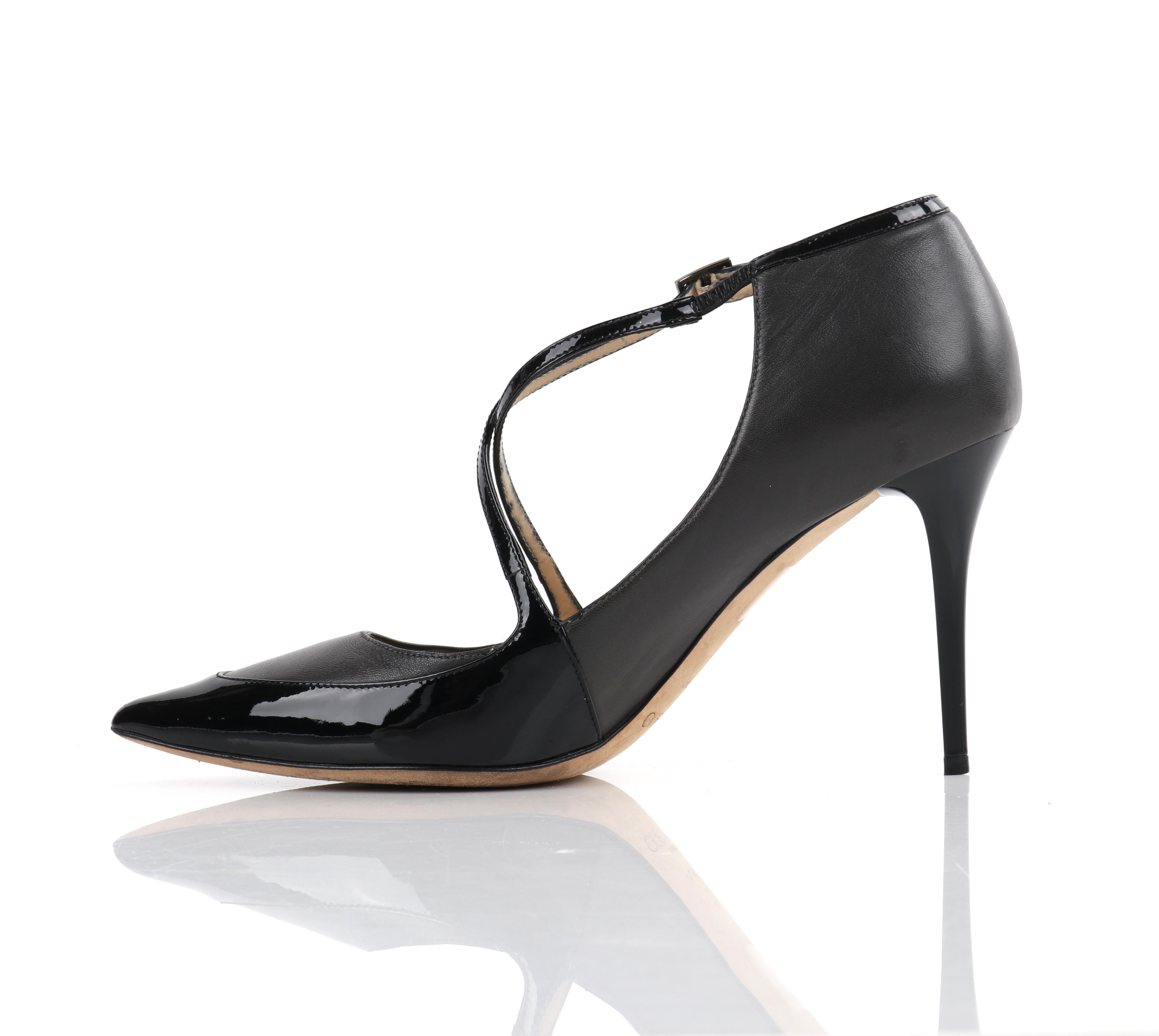 JIMMY CHOO “Madera” Gray Black Leather Criss Cross Strap Pointed Toe Pump Heels 
Estimated Retail: $695.00
 
Brand / Manufacturer: Jimmy Choo
Circa: 2014 
Style: Strappy heels
Color(s): Gray, black
Unmarked Materials (feel of): Exterior: Leather,