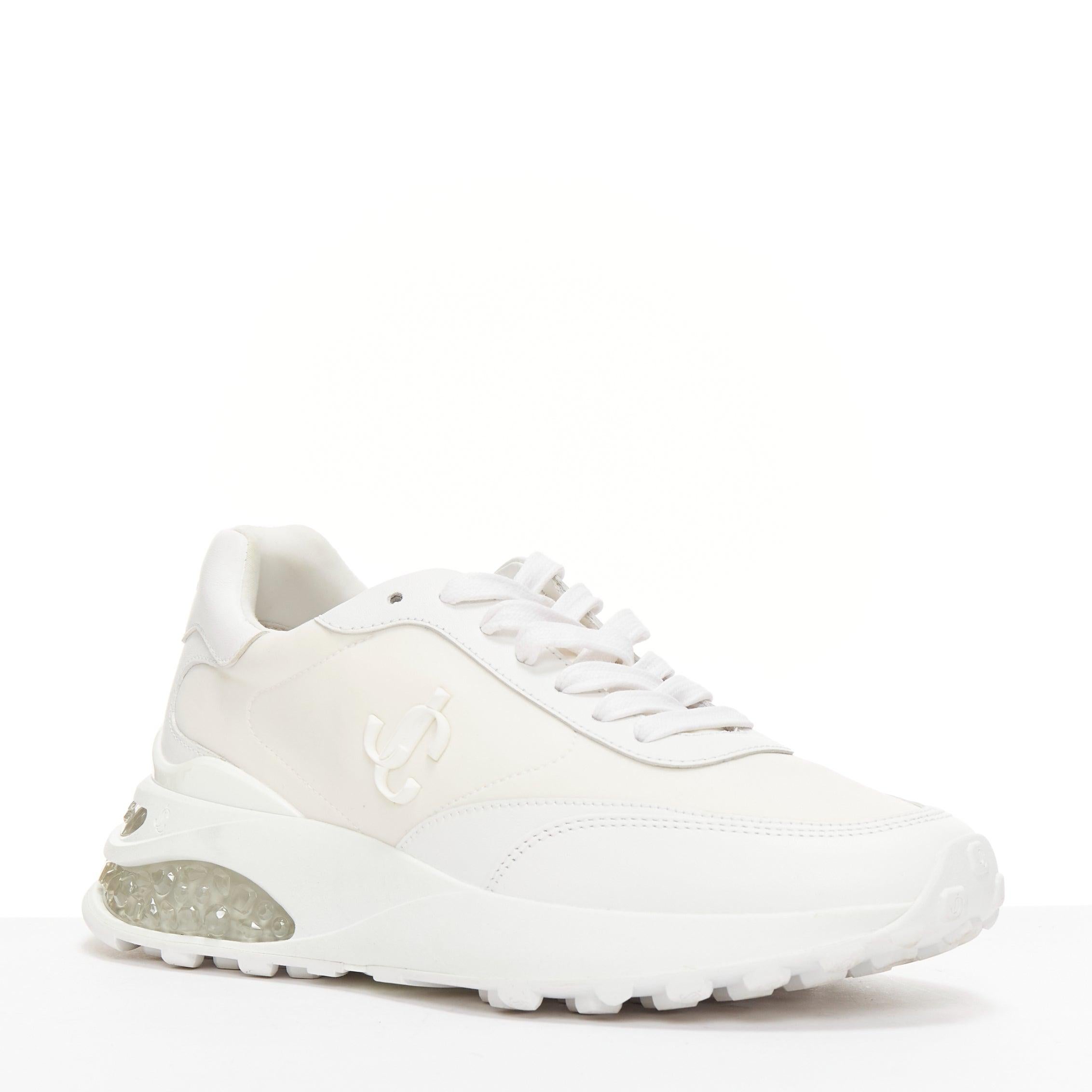 JIMMY CHOO Memphis white JC logo clear debossed crystal dad sneakers EU38.5
Reference: AAWC/A01170
Brand: Jimmy Choo
Model: Memphis
Material: Leather, Fabric
Color: White, Off White
Pattern: Solid
Closure: Lace Up
Lining: White Fabric
Extra Details:
