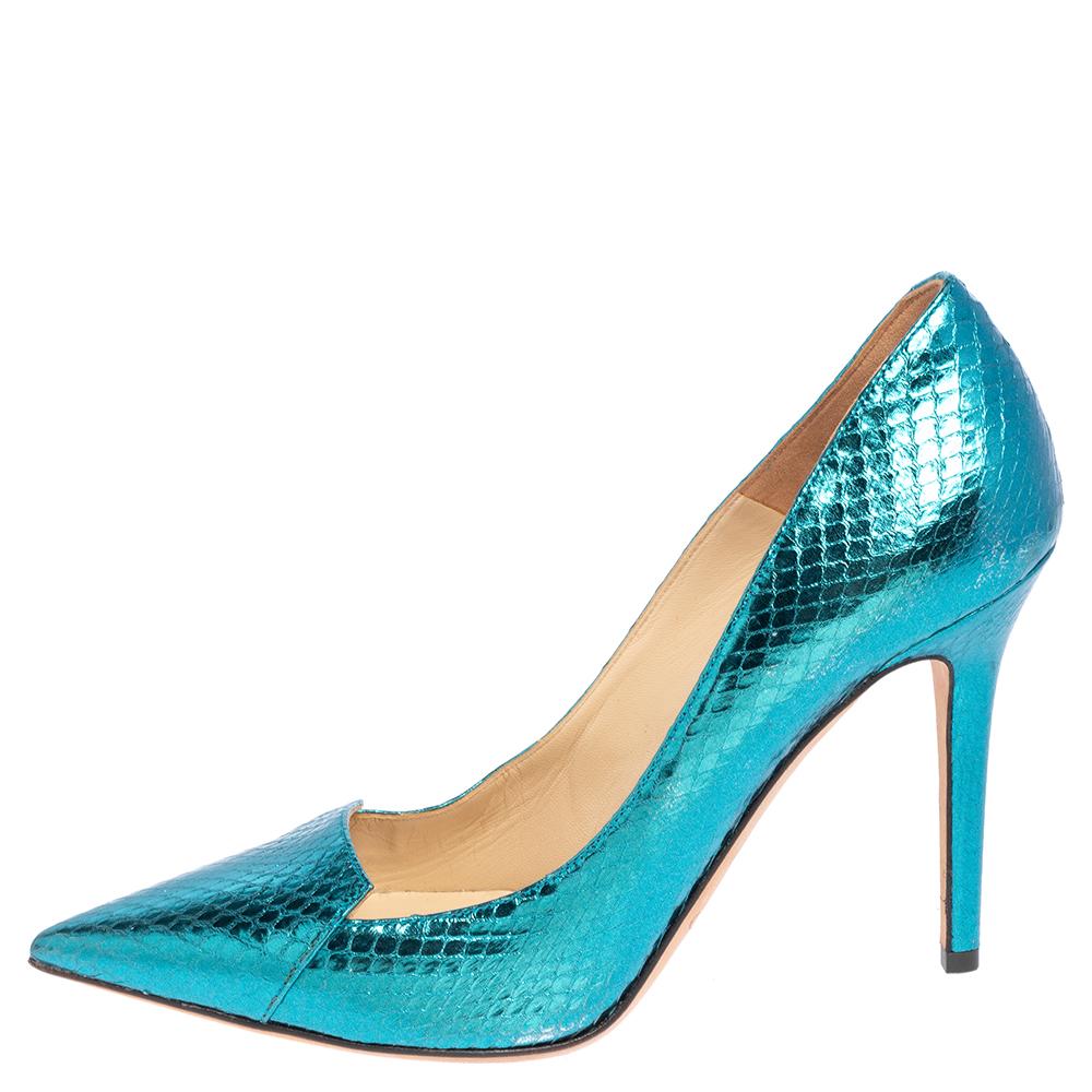 Pointed toes are evergreen, that's why this Jimmy Choo pair of pumps are valuable and buy-worthy. The metallic blue pumps are wonderfully crafted from snakeskin and they are shaped as pointed toes and balanced on 11.5 cm heels. (Available for UAE