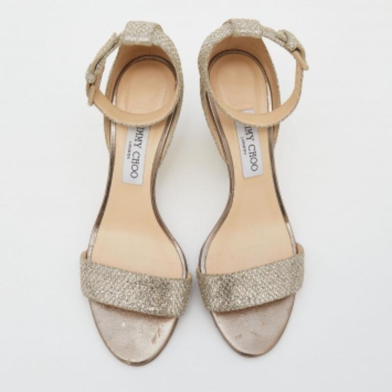 Jimmy Choo Sandalias con tira al tobillo de purpurina dorada metalizada talla 39.5 Oro en venta
