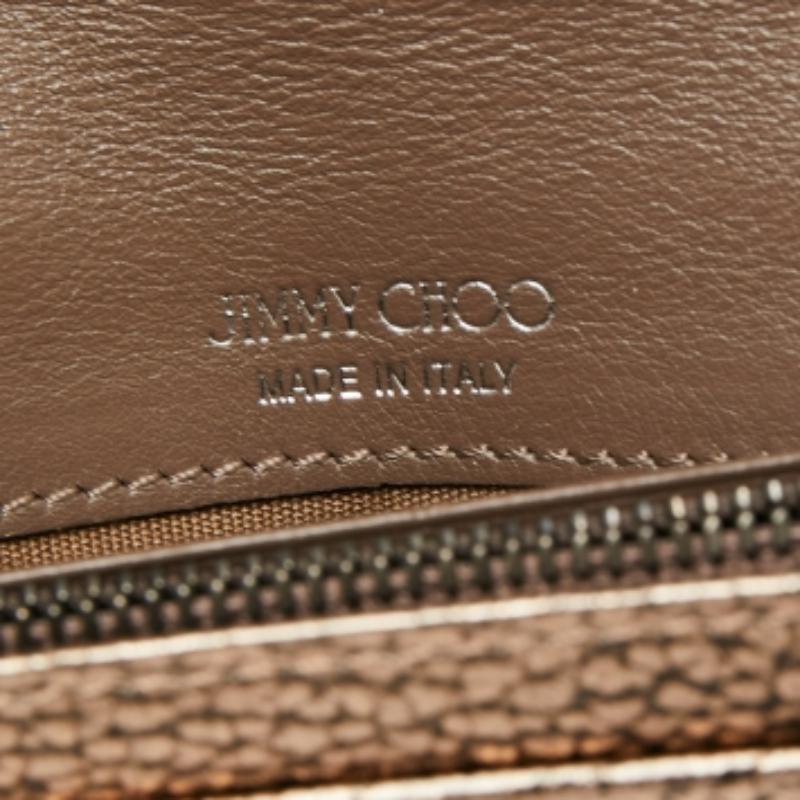 This Jimmy Choo wallet is an immaculate balance of sophistication and rational utility. It has been designed using prime quality materials and elevated by a sleek finish. The creation is equipped with ample space for your monetary essentials.