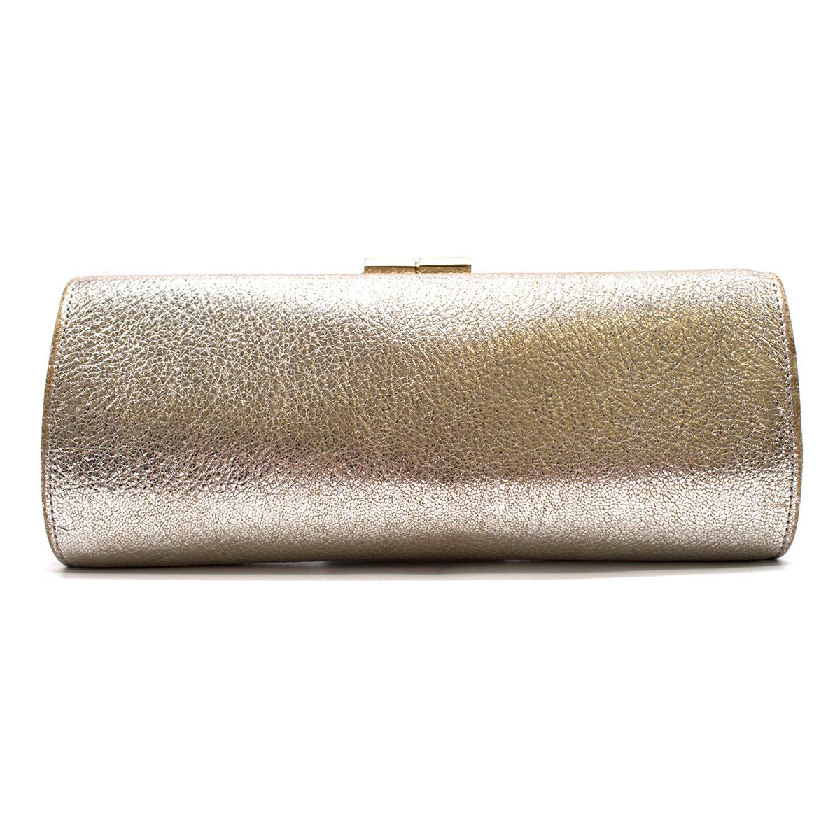 Jimmy Choo Silver Leather Clutch

-Silver tone leather clutch
-'Jimmy Choo' embossed clasp
-Beige lining
-One interior pocket

-The clutch was bought at a sample sale

Please note, these items are pre-owned and may show signs of being stored even
