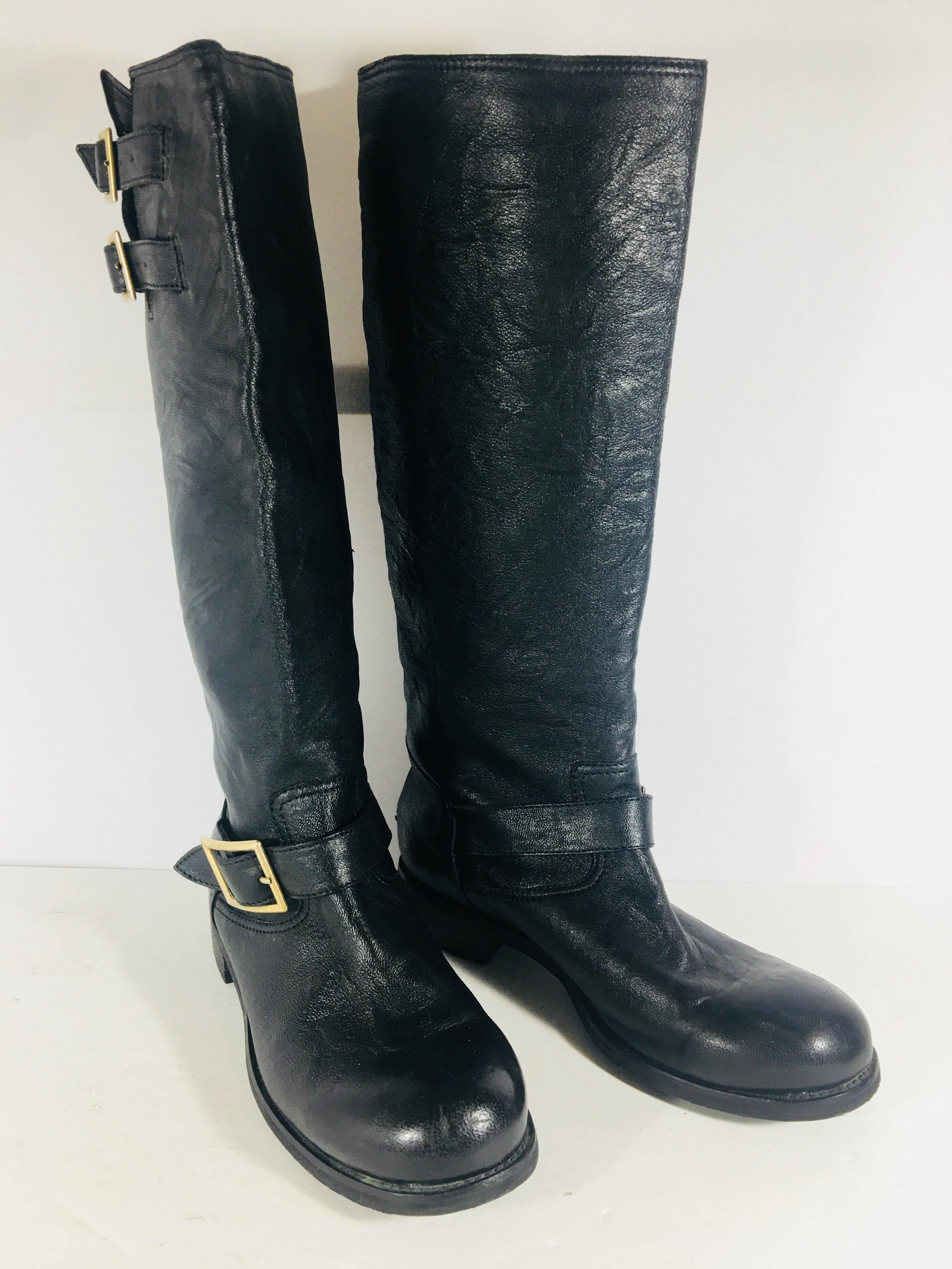 Jimmy Choo Black Leather Knee High Motorcycle Boot with Gold Hardware.