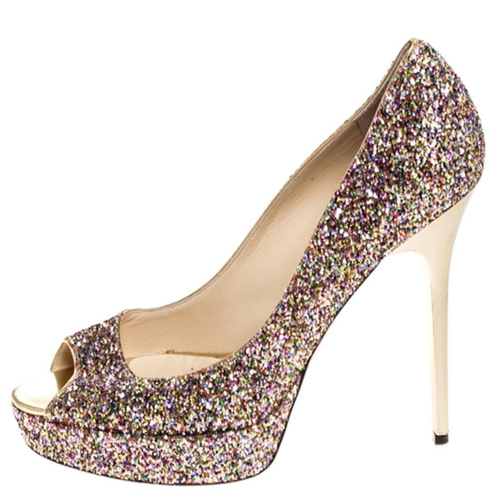 Shimmering and very stylish, these pumps from Jimmy Choo definitely need to be on your wishlist. The pumps are covered in glitter and feature a peep-toe silhouette. They flaunt 13 cm heels and come equipped with comfortable leather-lined
