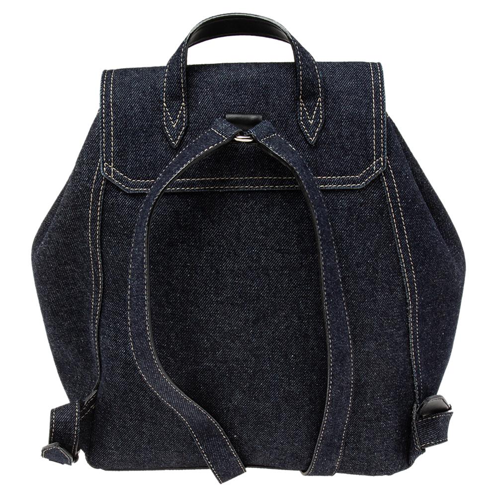 This Jimmy Choo backpack is an accessory you can bank on. It is stylish, simple, and highly spacious. The backpack has a lined compartment, a top handle, and two shoulder straps that can be adjusted.

Includes: Original Dustbag, Authenticity Card,
