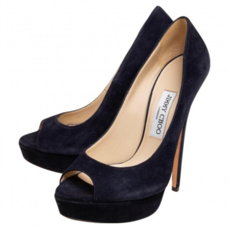 Up your shoe game this season with these Jimmy Choo Dahila pumps! They have been beautifully crafted from suede on the exterior with platforms, peep-toe silhouette, and low-cut vamps. The pair's navy blue shade will suit most of your party outfits.