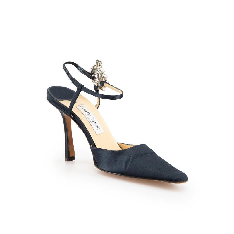 CONDITION is Very good. Minimal wear to heels is evident. Minimal creasing and slight abrasion to the top line of both shoes on this used Jimmy Choo designer resale item.
 
Details
Navy
Satin
Heels
Pointed toe
High heel
Crystal embellished