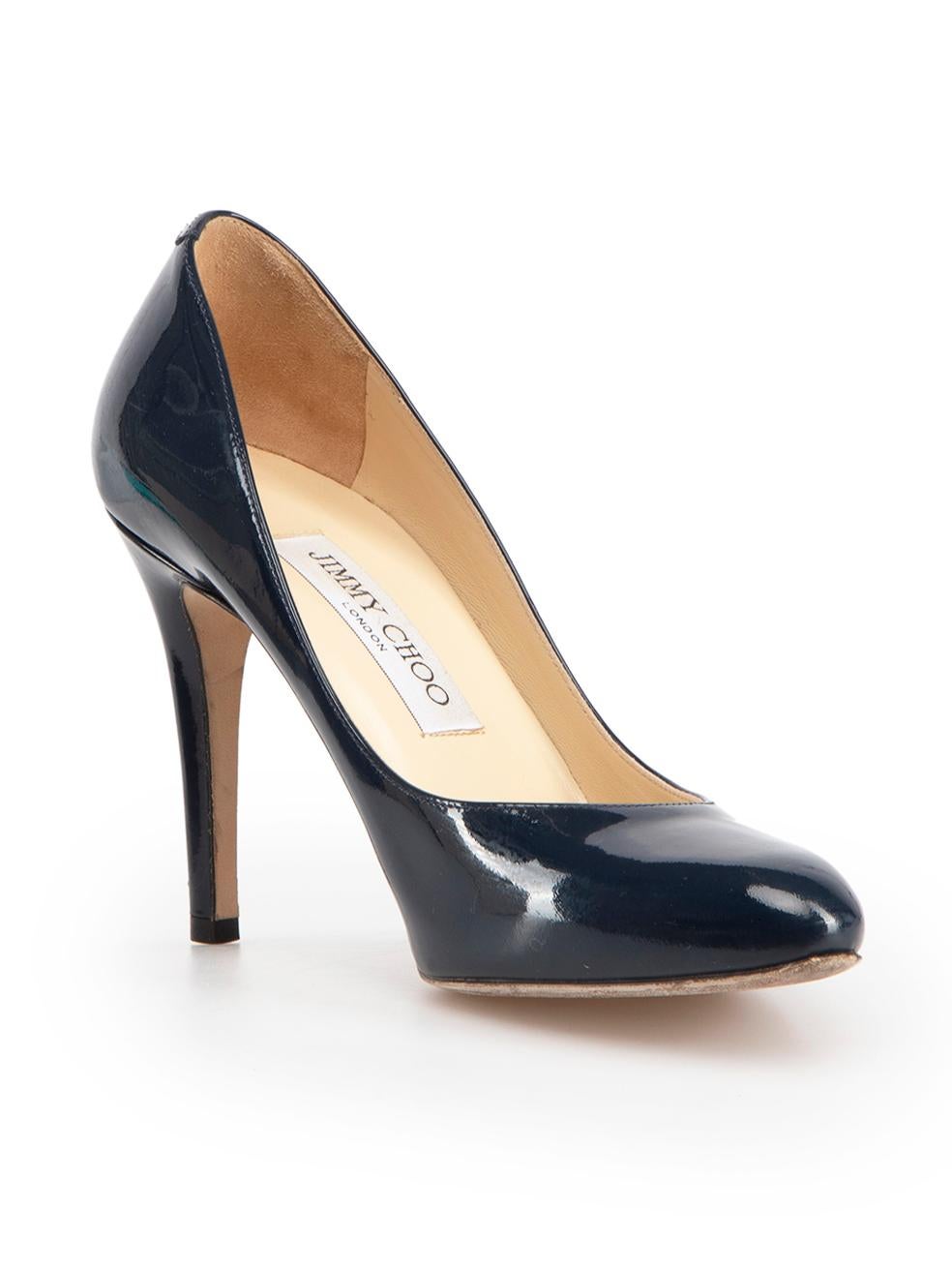 CONDITION is Very good. Minimal wear to shoes is evident. Minimal wear to the left shoe heel with an indent on this used Jimmy Choo designer resale item. These shoes come with original box and dust bag.



Details


Navy

Patent