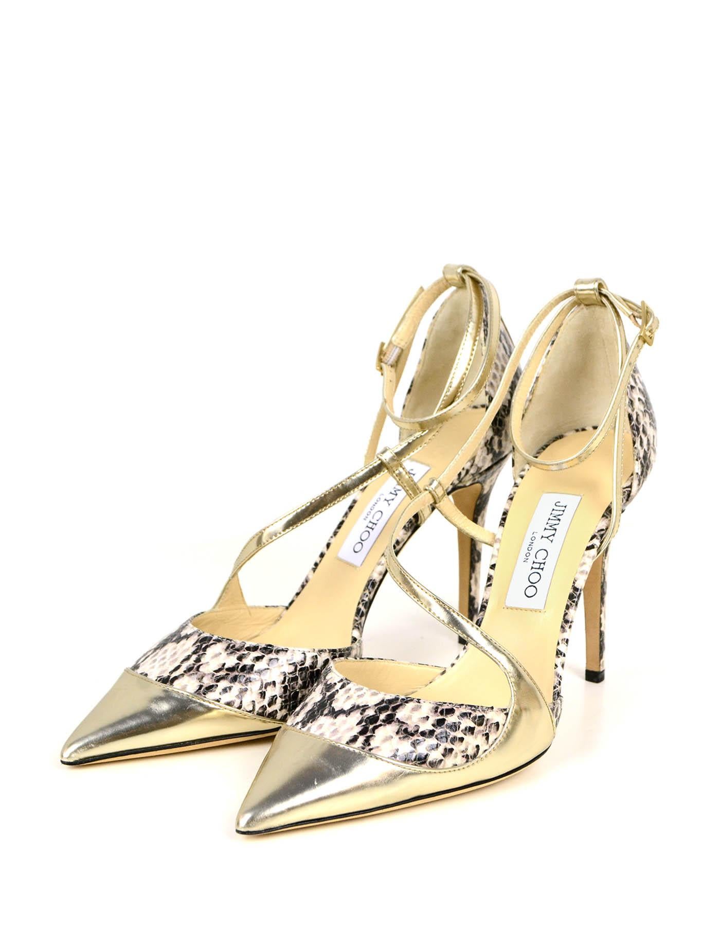Jimmy Choo NEW Snakeskin & Leather Point Toe Strappy Heels

Made In: Italy
Color: Gold metallic, black, tan
Hardware: Buckle
Materials: Snakeskin, leather
Closure/Opening: Ankle strap
Overall Condition: Excellent, never worn.  A couple small