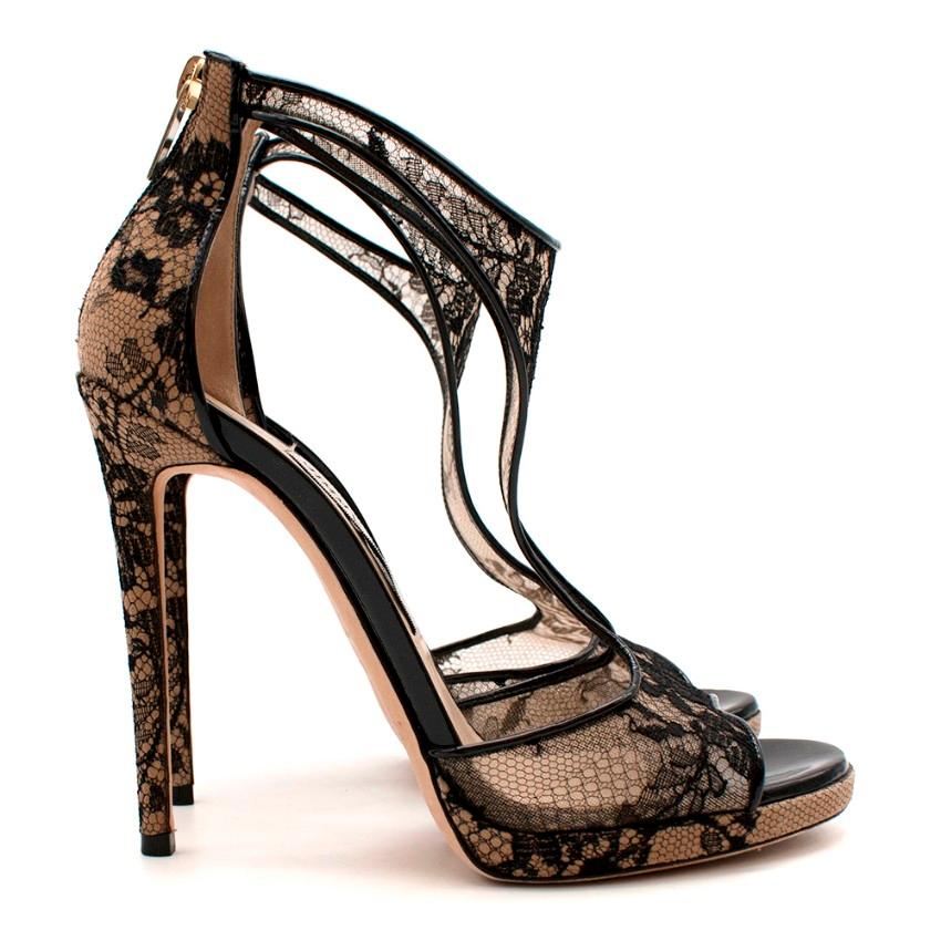 Jimmy Choo Nude Black Lace Heels 

- Black floral lace
- Open toe
- Stiletto heel
- Leather lined
- Leather sole
- Back zip fastening 

Made in Italy

Heel height - 12.5cm
Insole - 24.5cm
Length - 25cm
