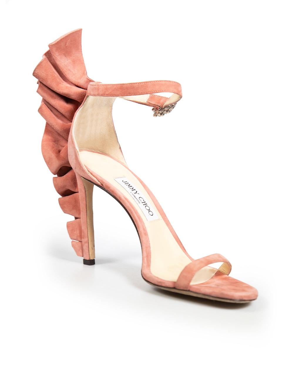 CONDITION is Good. Minor wear to the shoes is evident. There are abrasions to the front tip and heel tip of the shoes. The insole, the side of the shoes and the ruffle detail on the heel are discoloured on this used Jimmy Choo designer resale item.

