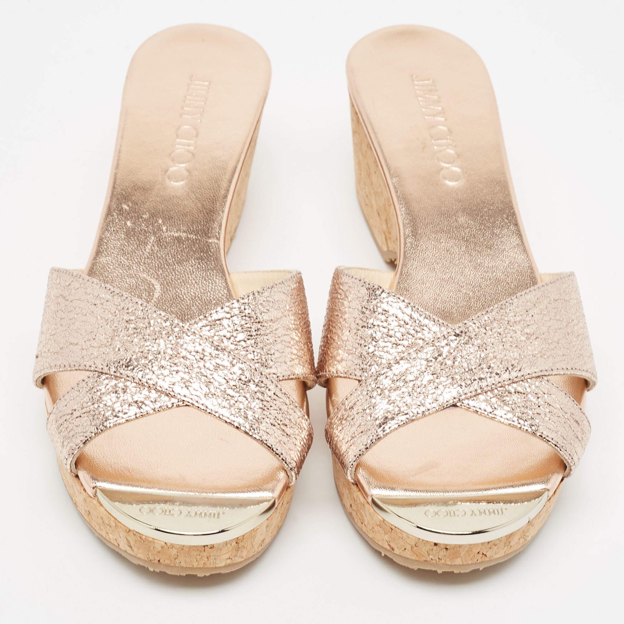These timeless Jimmy Choo slides are meant to last you season after season. They have a comfortable fit and high-quality finish.

