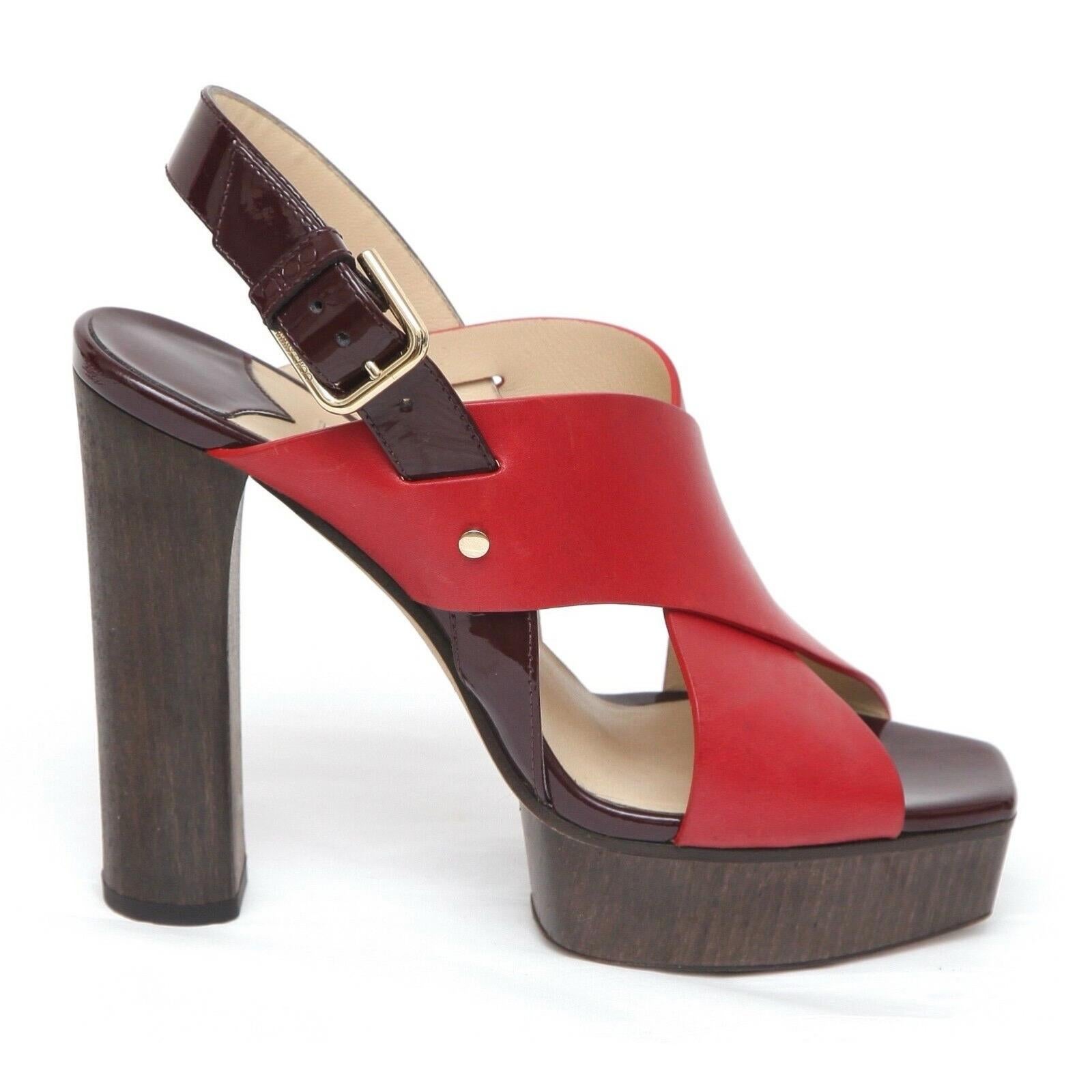GUARANTEED AUTHENTIC JIMMY CHOO AIX 125 LEATHER LEATHER PLATFORM SANDALS

Retail excluding sales taxes, $950

Design:
- Red leather thick strap over vamp.
- Wood platform and heel.
- Patent leather trim, base and toe of insole.
- Gold-tone metal