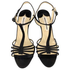 JIMMY CHOO pumps come in leopard print pony hair leather with a peep toe, and pa