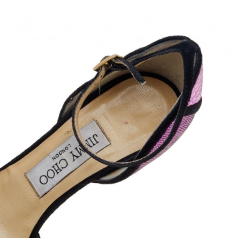 Brought to you by Jimmy Choo, these sandals are a pair that will add endless class to your outfit. They are made from metallic-pink python-embossed leather and suede. They showcase platforms, 17.5 cm heels, and an ankle strap. They are fitted with