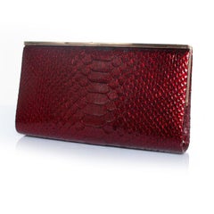 Jimmy Choo, python leather clutch in metallic red