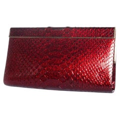 Jimmy Choo, python leather clutch in metallic red