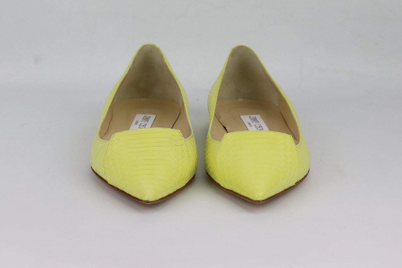 Jimmy Choo python pointed toe ballerina flats. Yellow python pumps with pointed toe and geometric shape at the toes. Yellow. Slips on. Does not come with box or dustbag. Size: EU 38.5 (UK 5.5, US 8.5). Heel: 0.4 in. Insole: 9.5 in