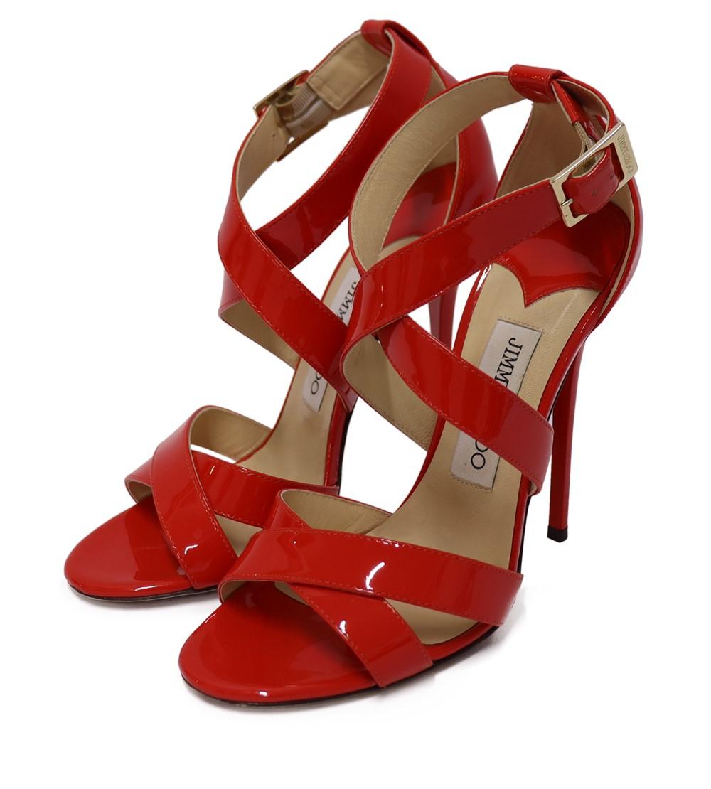 Jimmy Choo Red Patent Leather Louise Strappy Sandals, Features a strappy silhouette, open toes, and buckled ankle straps. 

Material: Patent Leather 
Size: EU 36.5
Heel Height: 12cm
Overall Condition: Excellent
Interior Condition: Signs of