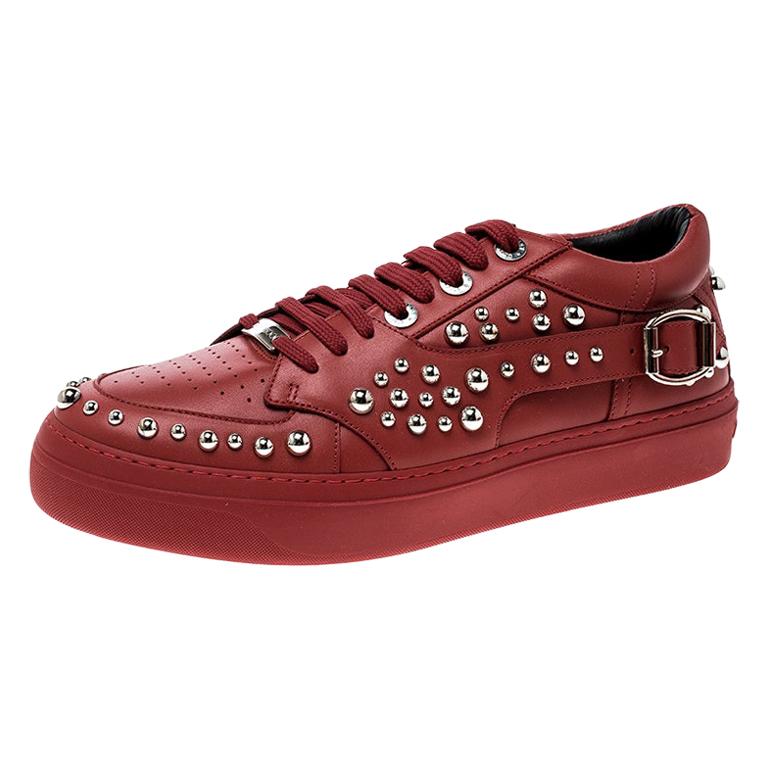 red studded sneakers
