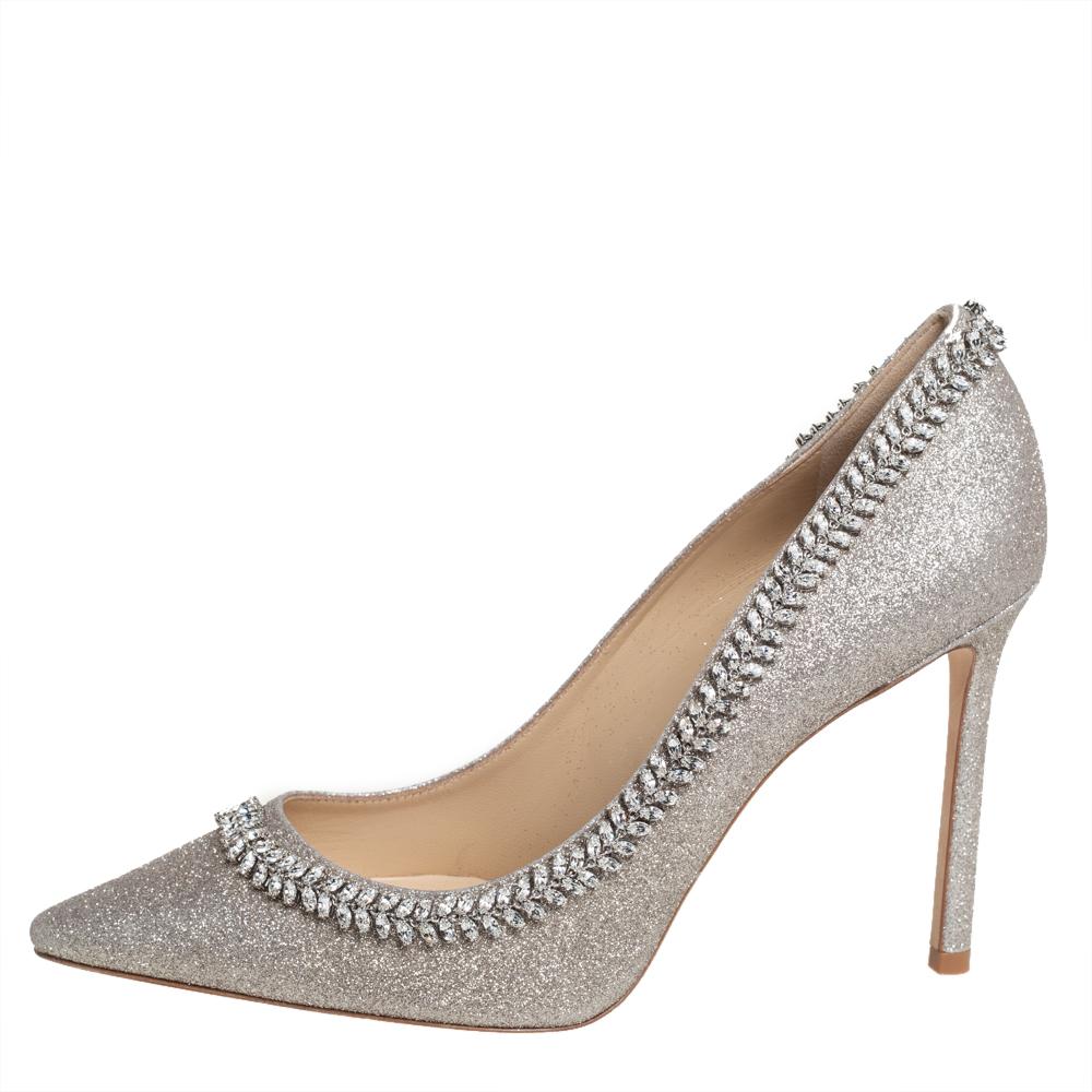 The iconic Jimmy Choo Romy pump is updated with a light of crystals atop a glittering backdrop. The pumps are lined with leather and lifted on 10.5 cm heels.

Includes: Original Dustbag, Original Box, Info Booklet