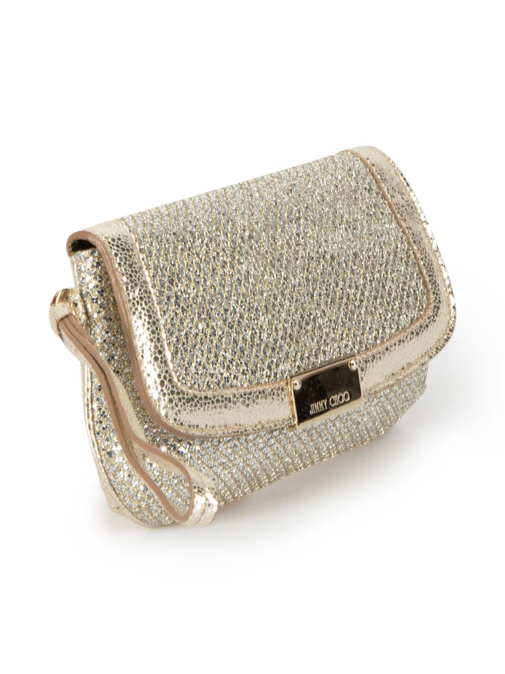CONDITION is Very good. Minimal wear to clutch is evident. Minimal wear to interior lining where colour marks is evident. Minor pilling to edge of wristlet handle is visible on this used Jimmy Choo designer resale