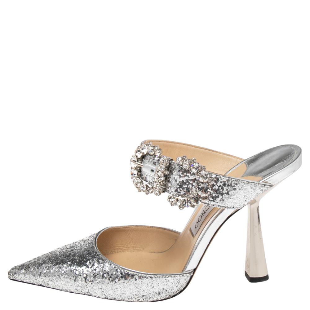 Made just for you to dazzle away with elegance, these Jimmy Choo sandals are truly a catch! They've been beautifully crafted and designed with crystal embellishments, bows on the uppers, and 11 cm heels.

Includes: Original Dustbag, Original Box,