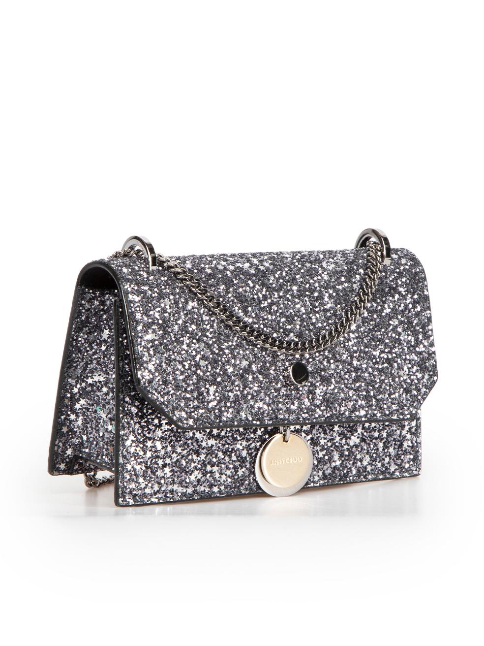 CONDITION is Never worn, with tags. No visible wear to bag is evident on this new Jimmy Choo designer resale item. This bag comes with original box and dust bag.
 
Details
Finley
Silver
Glitter
Mini crossbody bag
Two ways chain shoulder strap
Front