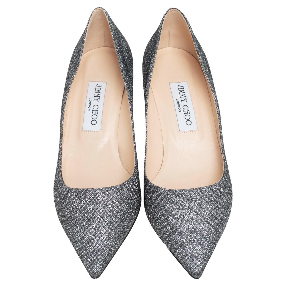 Known for their elegant and high fashion designs, Jimmy Choo Romy never fails. Make a style statement while flaunting this pair that has been made in Italy. Crafted from lurex fabric, they feature pointed toes, 6.5 cm heels and snug