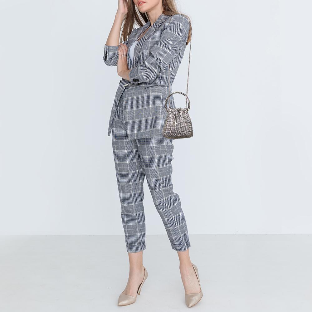 This Jimmy Choo Bon Bon bag comes in a bucket silhouette and exemplifies the label's glamorous spirit. Made from satin, the creation is detailed with crystal mesh, a bangle-like handle, and a slender strap. Carry it by the crook of your arm or on