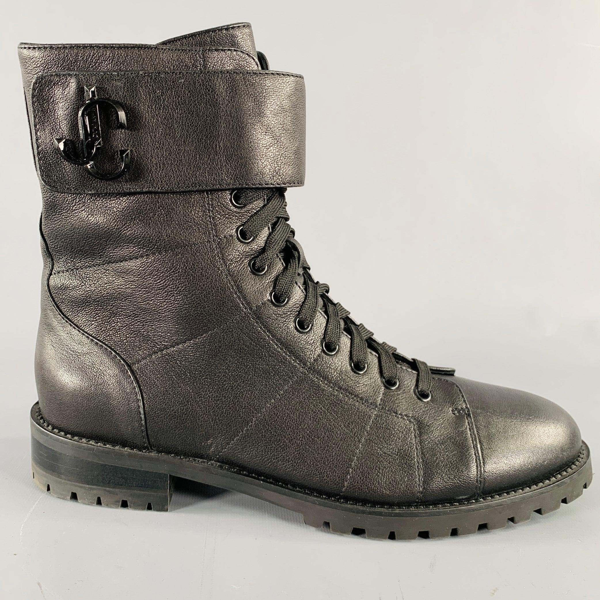JIMMY CHOO boots
in a black leather featuring rubber sole, and side zip and lace-up closure. Made in Italy.Very Good Pre-Owned Condition. Moderate scuff on left toe. 

Marked:   IT 43 

Measurements: 
  Length: 11.75 inches Width: 4 inches Height: