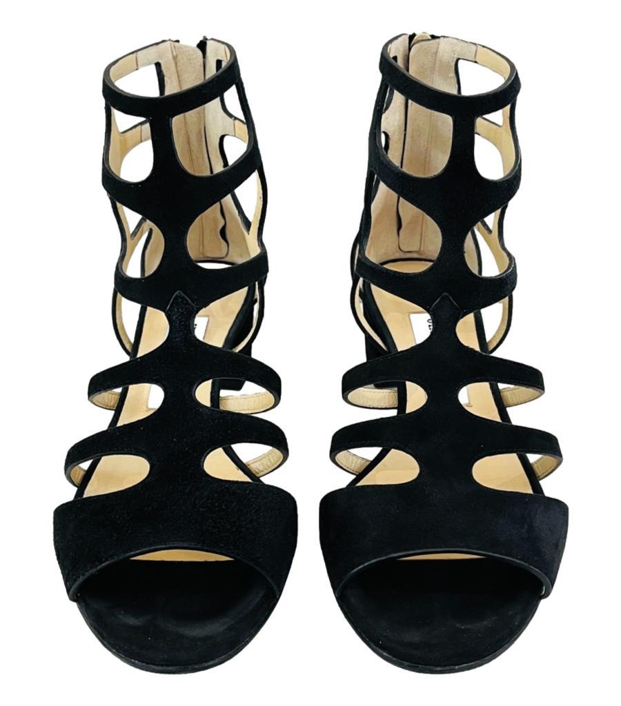 Jimmy Choo Suede Sandals
Black 'Ren' sandals designed with cut-out strap details.
Featuring open toe, short block heel and zip closure to rear. Rrp £595
Size – 37
Condition – Very Good
Composition – Suede (Minor mark and small signs of wear)
Comes
