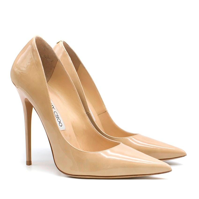 Jimmy Choo Tacco 120 Nude Patent Leather Pumps
 
 - Nude patent leather pumps
 - Pointed toe
 - 120mm stiletto heel
 - Slip-on style
 - Nude leather lining with logo embossed
 - This item comes with the original dust bag and shoe box.
 
 Please