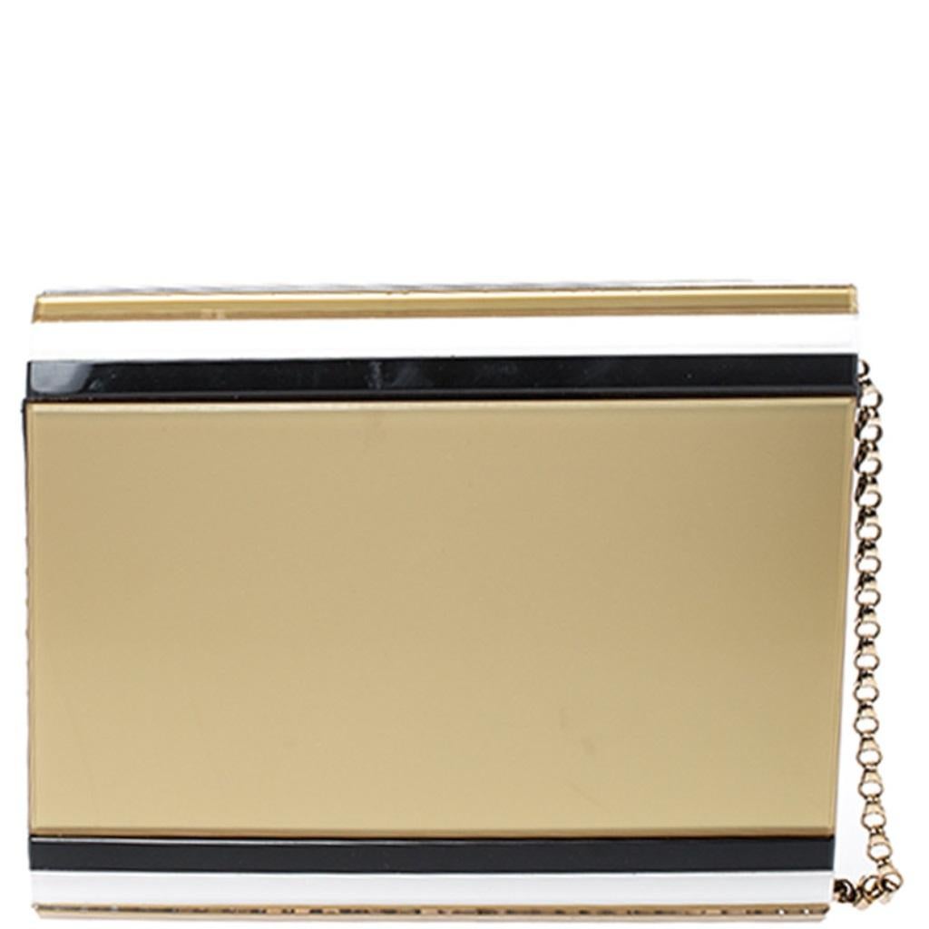 Classy and super stylish, this clutch bag is a Jimmy Choo creation. It has been wonderfully crafted from acrylic and shaped to complement all your elegant outfits. The insides are lined with suede and sized to carry your necessities. The clutch bag