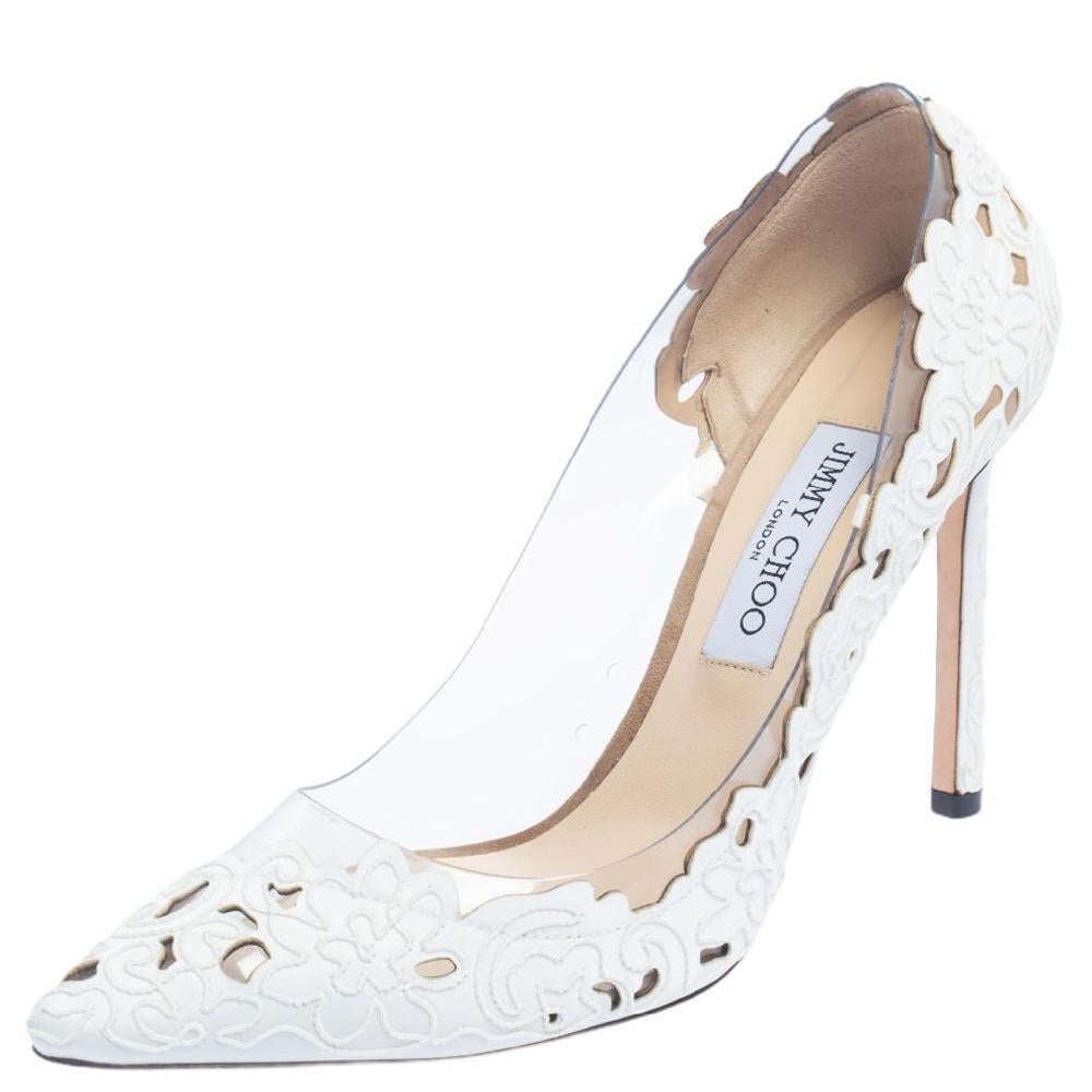 Jimmy Choo's iconic Romy is updated with PVC and lace fabric to create a striking design. The pumps feature the signature pointed-toe silhouette and are mounted on slim heels. These Romy 100 pumps will be perfect as bridal shoes too.

Includes: