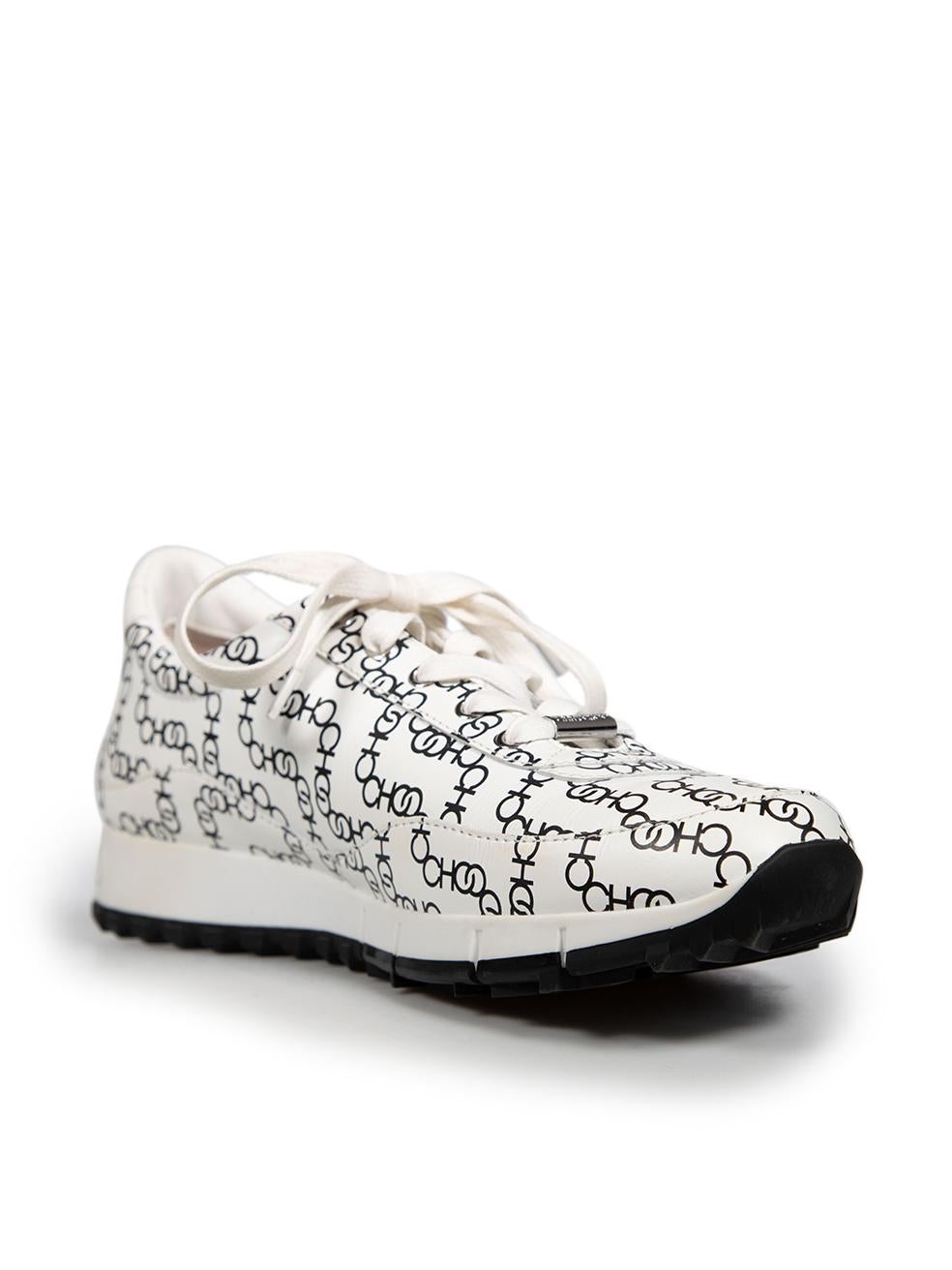 CONDITION is Very good. Minimal wear to trainers is evident. Creasing to the leather at the front and on the pull tabs of both shoes, the insoles of both shoes are loose on this used Jimmy Choo designer resale item. The item comes with a dust bag.

