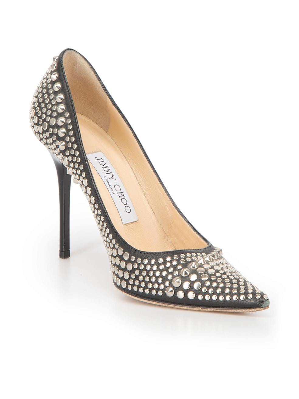 CONDITION is Very good. Minimal wear to heels is evident. Minimal wear to the silver studs and the outsole on this used Jimmy Choo designer resale item.



Details


Black

Leather

High heels

Point-toe

Silver tone studs

Slip