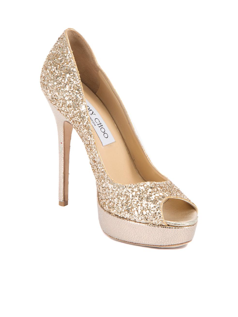 CONDITION is Very good. Hardly any visible wear to shoes is evident on this used Jimmy Choo designer resale item.   Details  Gold Glitter Slip on heels Peep toe Platform high heel Leather interior   Made in Italy  Composition EXTERIOR: Glitter