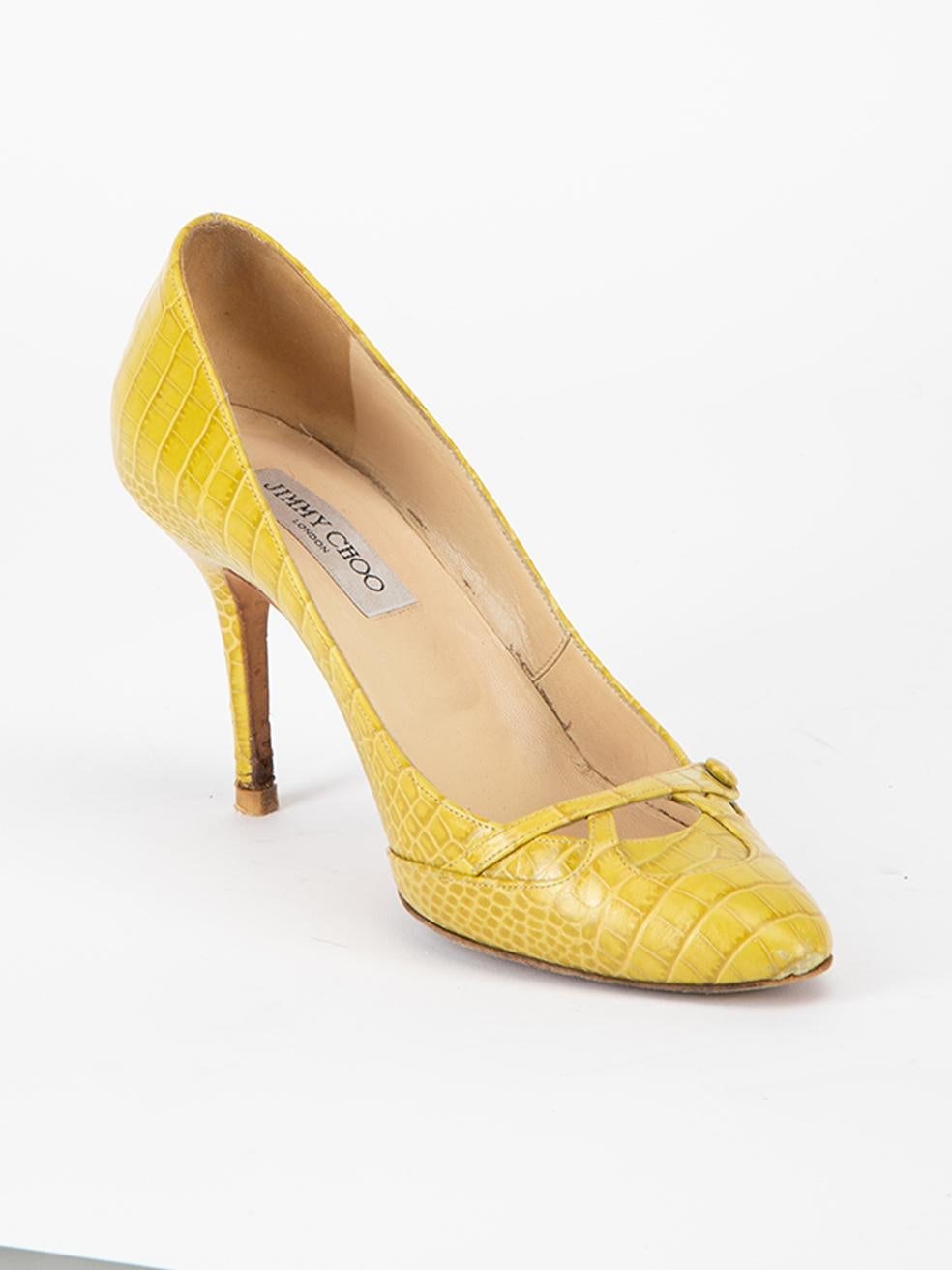CONDITION is Very good. Minimal wear to heels is evident. Wear can be seen to toe tips, outer vamp material and interior suede material. There is also wear to both heel tips on this used Jimmy Choo designer resale item.   Details  Green Crocodile