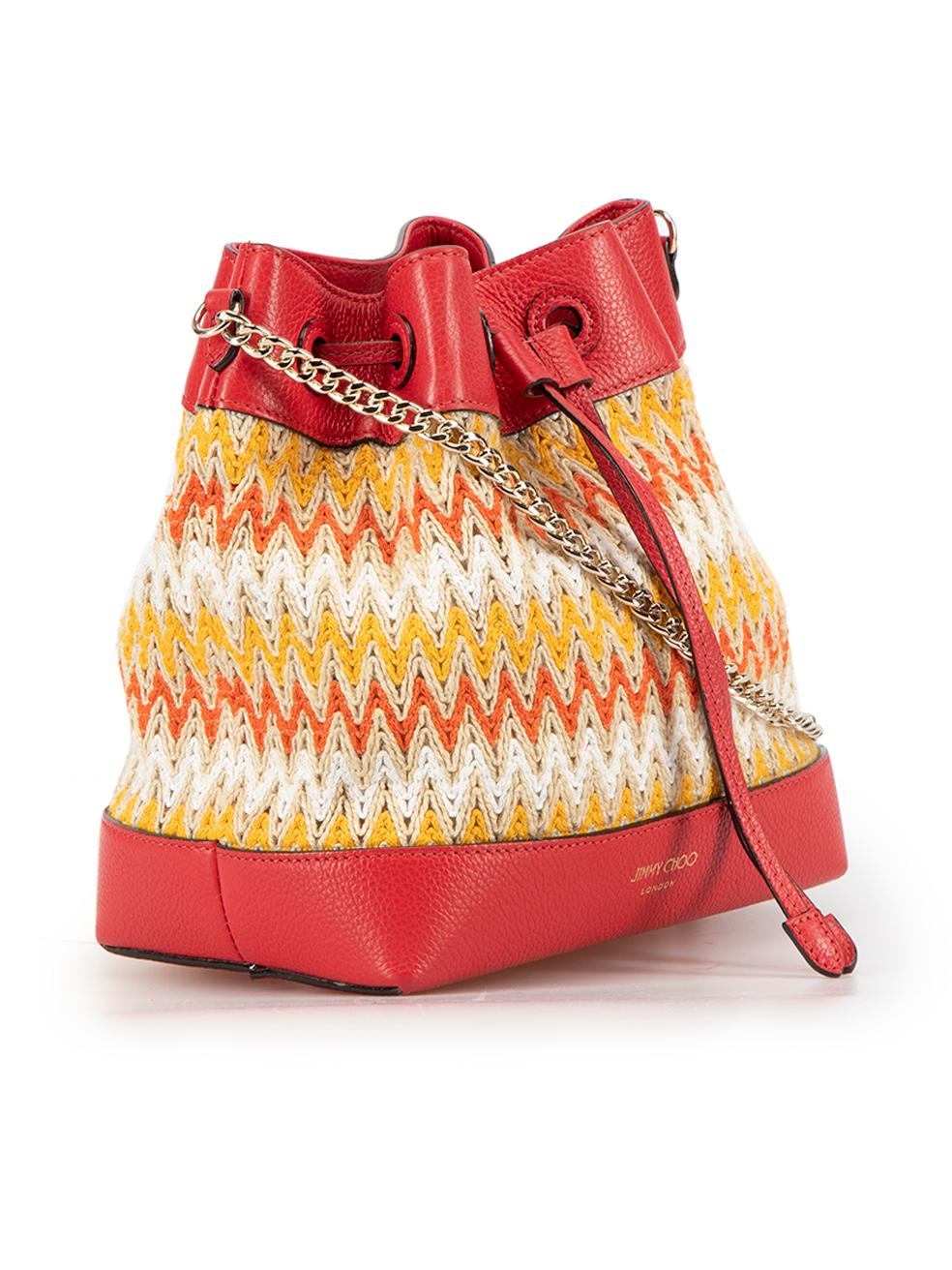 CONDITION is Very good. Hardly any visible wear to bag is evident on this used Jimmy Choo designer resale item.



Details


Red

Wicker weave

Bucket bag

Zig-zag pattern

Red leather trim

Drawstring fastening

Silver tone hardware

Chain and