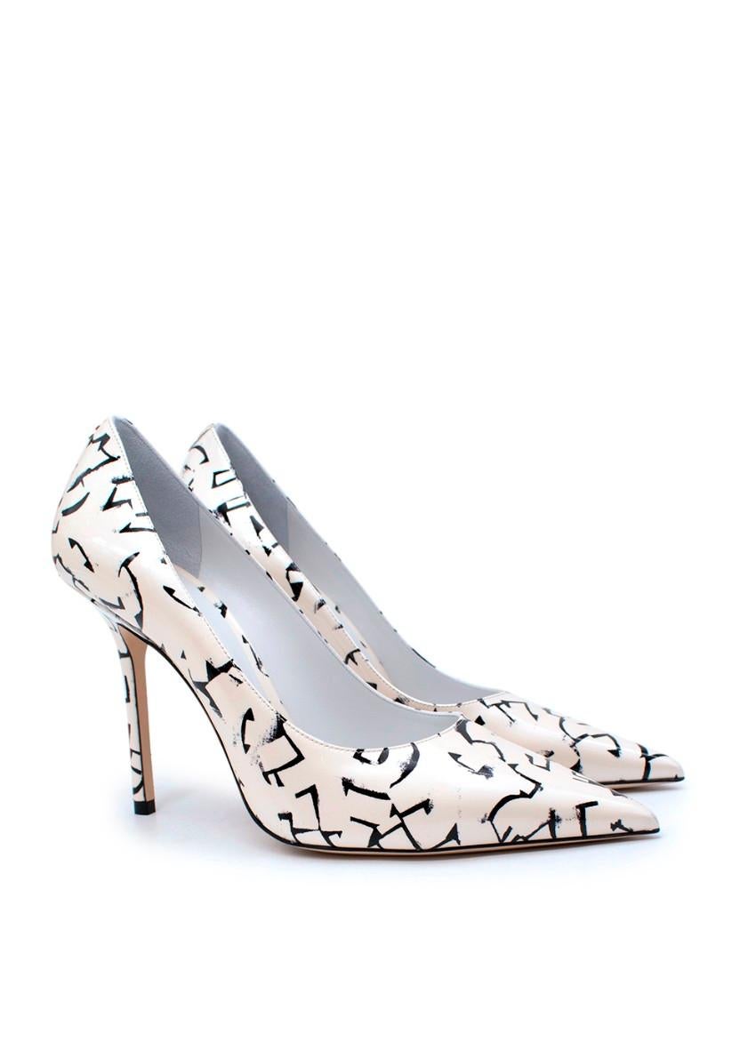Jimmy Choo x Eric Haze LoveWhite & Black Printed Leather Heeled Pumps
 
 
 
 - Black graffiti-style graphics on a white patent background
 
 - Pointed toe, set on a high stiletto heel
 
 - Signature JC monogram has been transformed into Eric Haze's